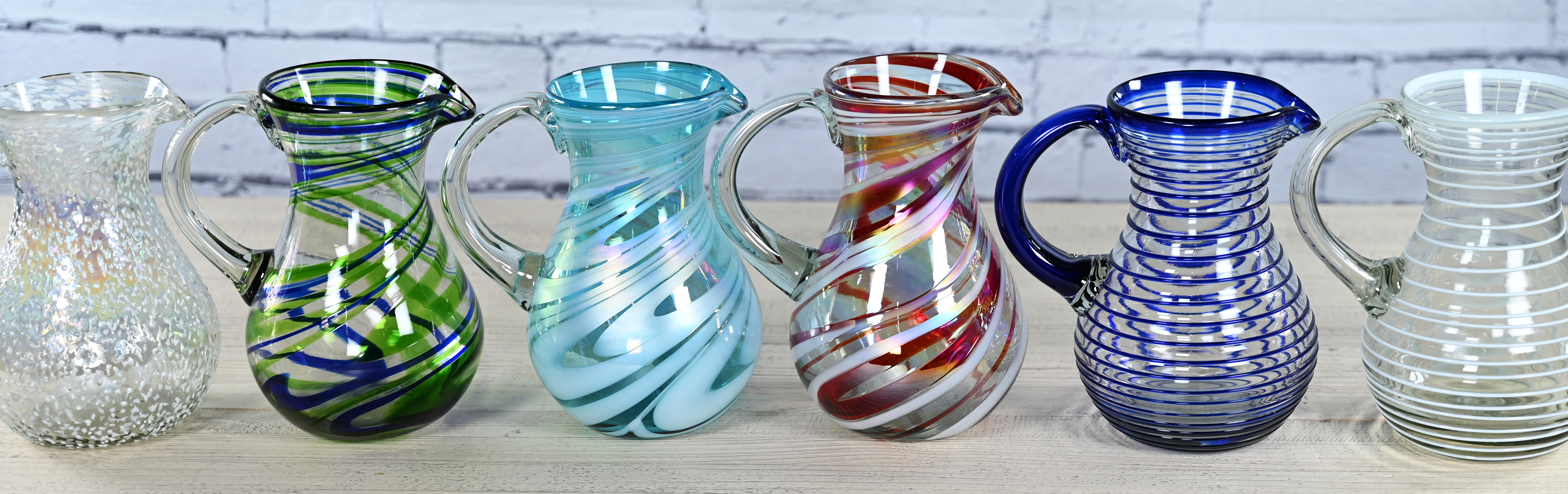 Hand blown glass pitchers